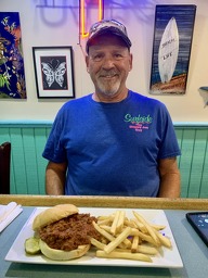Dennis, better known as the Sloppy Joe Guy, even has his own shirt for his dinners at Surfside!